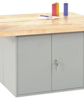 Industrial Grade Locker Workbench Featuring Dual Steel Doors And Thick Hardwood Top Built To Kick Some Serious Shop Butt Made In Usa, close-up view.