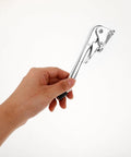 Hand holding Heavy Duty Zinc Alloy Wall Door Stop With Silver Minimalist Design Kickdown Door Stopper Space Saving Wall Saver