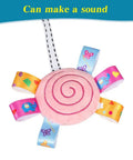 Travel Arch Bassinet Toy Clip On Stroller Toy with pink squeaky plush spiral detail for infants and toddlers.