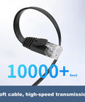 Close-up of a black 6.6 Ft Retractable Flat Cat6 Ethernet Cable with transparent RJ45 connector showing flexibility in bending.
