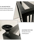 Close-up of Top Shelf Iron Table Legs With Bolt On Flange, Black Coated Steel Base featuring adjustable foot pads for stability.