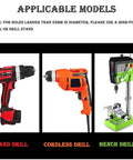 Three power drills: red handheld drill, orange cordless drill, and green bench drill on stand.
