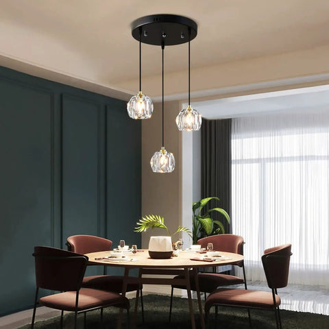 Three Light Crystal Chandelier With Dimmable LED Lighting For Kitchen Island And Dining Room, Adjustable Color Temperature 3000K 4000K 6000K, Clear Glass Shade over dining table.