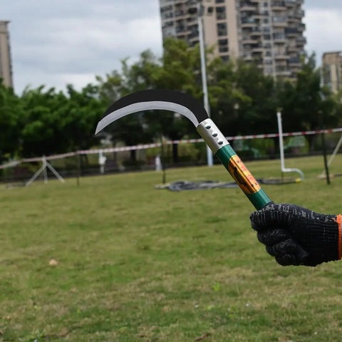 Heavy Duty Weeding Sickle With Manganese Steel Blade And Hardwood Handle Serrated Grass Hook Cutter in use, outdoor setting