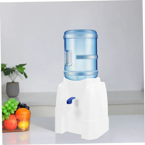 Portable Cold Water Dispenser For Countertop Space Saving Mini Water Cooler with blue bottle in kitchen setting