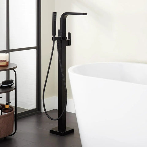 Hibiscus Straight Up Modern Freestanding Tub Faucet Forged From Solid Brass Featuring Integrated Hand Shower On Flex Hose for sleek bathroom design.