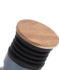 Crush Your Daily Brew Routine With This Straight Fire Manual Coffee Grinder featuring a rich walnut wood lid and silicone blower.