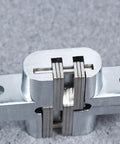 Close-up of Concealed Cross Hinges Two Pack Stainless Steel For Folding Doors And Wooden Cabinets Hidden Design Heavy Duty