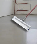 Spiked Screeding Roller For Self Leveling Cement Floors, 20 Inch By 1 Inch Spike Roller With Splash Guard in use on cement floor