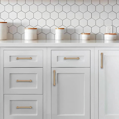 Top Shelf 10 Pack Brushed Brass Cabinet Pulls 5 Inch 128mm hole center drawer handles on sleek white cabinetry.