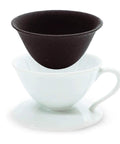 Prime Pick Japanese Ceramic Coffee Dripper With Reusable Filter And Ultra Fine Pores And Eco Friendly Hand Pour Setup For Straight Up Smooth Daily Brews Of Coffee Tea Or Water in black and white.