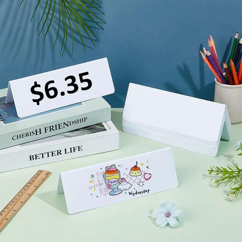 20 Pack Dry Erase Name Tent Cards For Table, 7.9x2.8x2.4 Inches White Reusable Name Plates on desk with books and stationery