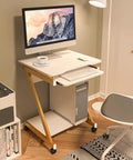 Adjustable Height Black Standing Desk With Pull Out Keyboard Tray And Compact Storage Shelf Portable Laptop Workstation in home office setup.