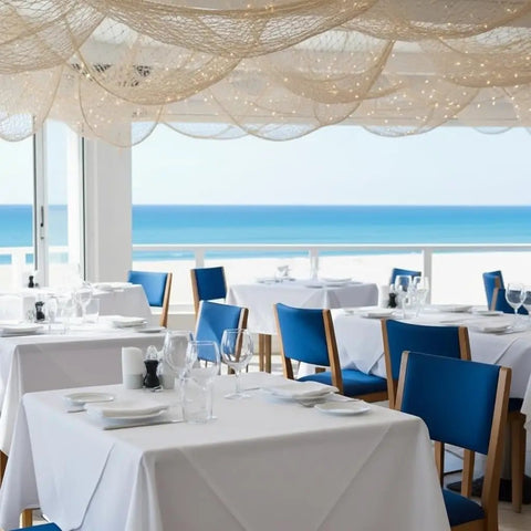 Ocean Party Net Decorations 2 Pack 39.37 by 78.74 Inch Fishing Net Backdrop hanging in seaside dining area with ocean view.
