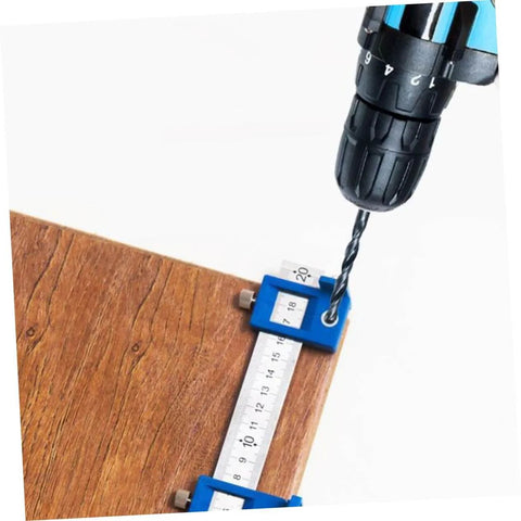 Adjustable Punching Tool For Woodworking Jig For Cabinet Handles installed on wood with drill bit in action