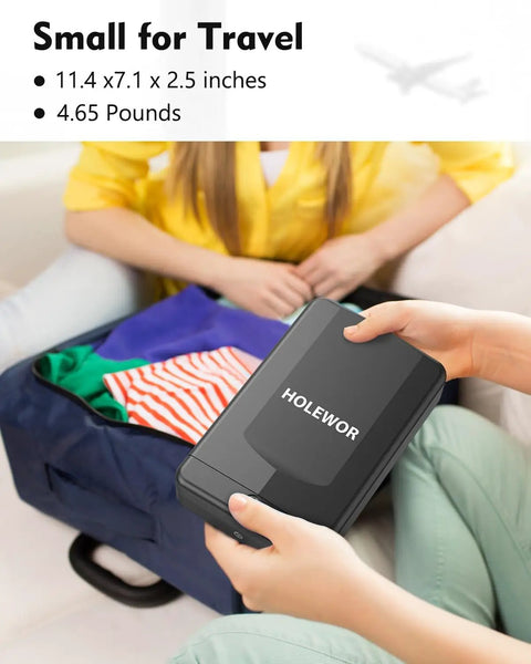 Person holding Compact Biometric Gun Safe For Handgun With Quick Access Fingerprint Lock Portable Pistol Safe For Car Travel Nightstand Bedside Fits Under Seat Trunk Grab And Go Security, size shown for travel.