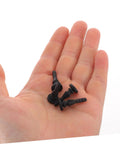 Twenty Piece Rock Solid Anti Vibration Fan Dampener Pins For PC Case Rig Setup Ultra Quiet Shock Absorbing Mount Hardware For Chill Cooling Builds in a hand.