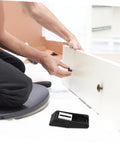 Person installing Two Pack Rubber Toggle Latch Clamps For Secure Storage And Quiet Draw Latches Versatile For Cargo Cabinets Doors.