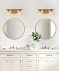 Gold Vanity Light 2-Light Fixture With Globe Clear Glass Shades For Bathroom, 16 Inch Length, shown above double sinks.