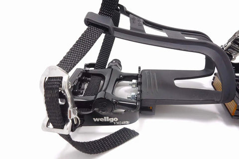 Close-up of Toe Clip Bike Pedals With Straps For 9 Sixteenth Inch Axles Universal Fit No Slip Grip Durable Lightweight Alloy And Resin Construction