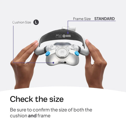 Hands holding AirTouch F30i Comfort Frame System Without Headgear With Large Cushion And Standard Frame For Gentle Quiet CPAP Therapy