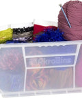 Clear plastic bin filled with colorful yarn, part of Space Saving Stackable Plastic Storage Bins Set Clear 12 Pack For Garage Pantry Craft Room Closet Organization Holds Up To 60 Lbs 15 X 8 X 7 Inches Ideal For Home Use And Workbench Or Craft Areas Grab And Go Organization.