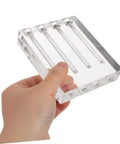 Hand holding clear acrylic Engine Oil Quality Tester And Viscosity Comparator For Automotive Maintenance An Easy To Use Pro Grade Tool