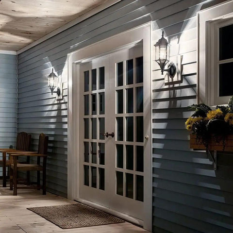 Coastal White Outdoor Wall Light With Clear Beveled Glass 17 Inch Tall 1 Light Exterior Porch Lantern on blue siding by door