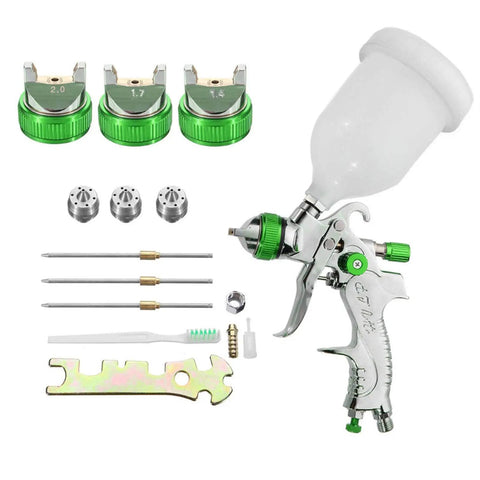 Top Tier Gravity Feed HVLP Air Spray Gun With 600Ml Cup And 1.7Mm Or 2.0Mm Nozzles including nozzle tips and accessories.