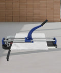 31 Inch Manual Tile Cutter Heavy Duty Precision Scoring Tool With Ball Bearings And Ruler Bar For Crisp Cuts On Wall Tiles Ceramic And Porcelain on a flat surface.