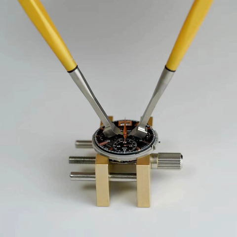 Pro Grade Extensible Brass Watch Movement Holders Set For Precise Repair And Assembly with watch dial secured by tweezers