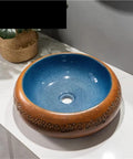 USZWBY Vessel Vanity Sink Retro Small Bathroom Sink Simple Round Above Counter Basin with Faucet and Drain Modern Countertop blue and brown ceramic sink on a countertop.
