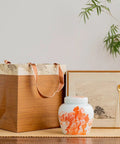 Premium Ceramic Tea Storage Canister Set With Sealed Coffee Bean Jars, featuring colorful jar, wooden tote, and decorative box.