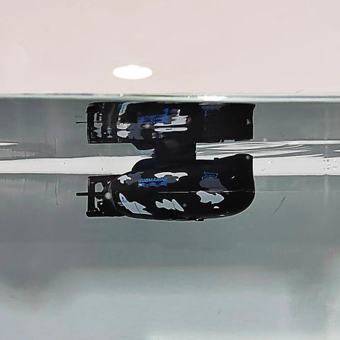 Mini RC Submarine Remote Control Boat Waterproof Dive Toy Black military model floating in water