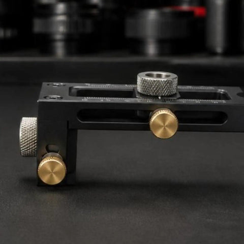 Dead On Positioning Guide With Swappable Stainless Bushings And Knurled Lock Knobs heavy duty alignment jig close-up of locking knobs and metallic components.