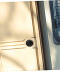 Flush pull slam latch, black, installed on boat cabin door.
