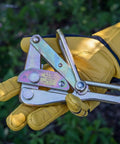 Chicago Grip For Bare Wire With Three Inch Jaw, V Groove Cable Clamp, held in gloved hand, 8 AWG to 6 AWG copper use