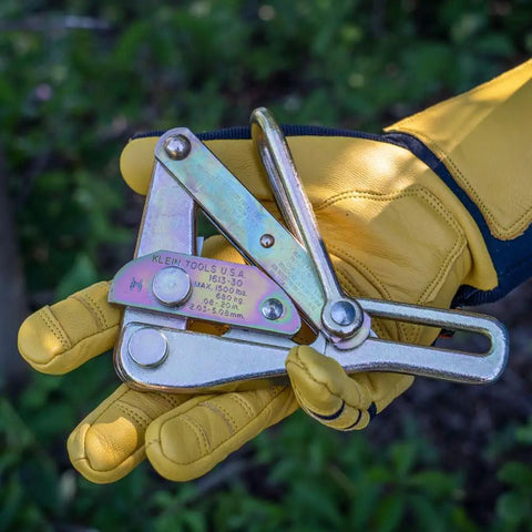 Chicago Grip For Bare Wire With Three Inch Jaw, V Groove Cable Clamp, held in gloved hand, 8 AWG to 6 AWG copper use