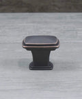 Oil Rubbed Bronze Square Cabinet Knob 1-1/4 Inch Diameter With Highlights, traditional style hardware, close-up view