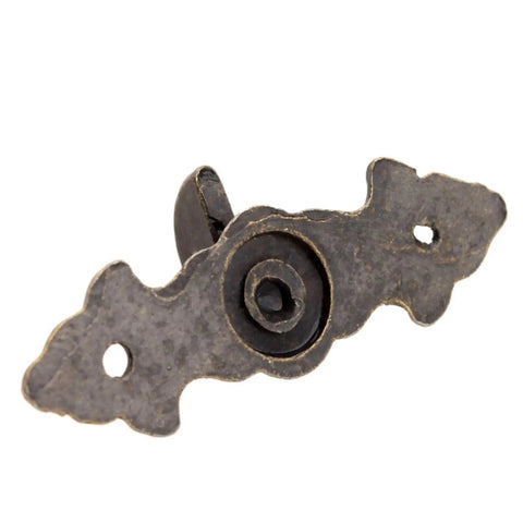 Close-up of a zinc alloy heart latch showing detailed design in antique bronze. Part of Five Piece Set Of Retro Antique Bronze Heart Shaped Box Hasp Lock Latches Featuring Tough As Nails Zinc Alloy Construction And Smooth Brass Plating To Keep Your Jewelry Boxes Solid And Fade Free Always.