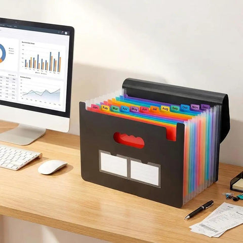 Accordion File Organizer With 13 Pockets Expanding File Folder on desk near computer monitor and receipts.