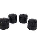 Four black 1.7 inch caps from Front Wheel Axle Hardware Kit For Riding Mowers And Tractors Includes Shaft Covers Gaskets Clamps Thrust Washers E Clips And Rubber Seals Durable 1.7 Inch Cap Replaces OEM Numbers 532188967 532121749 812000029 121749X M143338 R27434 M123254