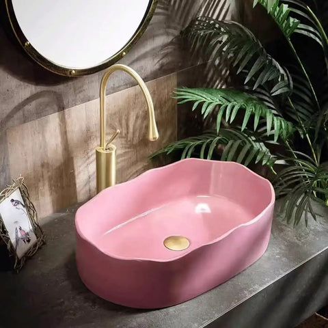 UMJIGF Vessel Sink Household Washbasin Bathroom Above Counter Basin in pink, featuring a modern design with gold faucet.