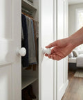 Installing Two Pack XL White Bi Fold Closet Dummy Doorknobs With Wide Backplate on wardrobe door in bedroom