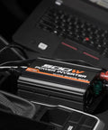 Ride Ready 500W Car Power Inverter Converts 12V DC To 110V AC With Dual USB Ports, compact design with connections in vehicle.
