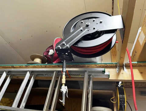 Retractable Air Hose Reel With Wall Or Ceiling Mount, Three Eighths Inch By Fifty Feet Hybrid Hose With Three Feet Lead In mounted on ceiling