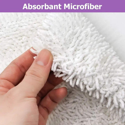 Close-up of Six Pack Replacement Steam Mop Pads for Shark S3500 Series showing absorbent microfiber texture held in hand.