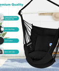 Black hammock chair with foot rest and cushions, durable metal spreader bar swing chair for indoor outdoor chill and relaxation