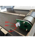 Close-up of motor and connector on DC 24V Stainless Steel Mini Conveyor Belt System For Vending Machines, 460mm Long