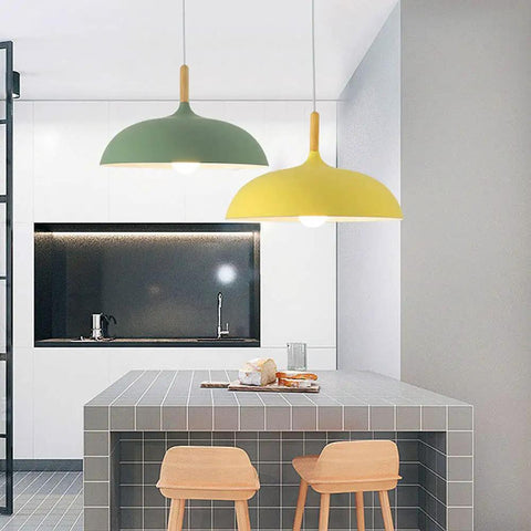 Modern Nordic Style Hanging Lamp Fixture Featuring Solid Wood Accents And Durable Iron Base Super Sleek Green Metal Shade For Kitchen Island Dining Table Bedroom Cozy Hangout Vibe in kitchen setting.